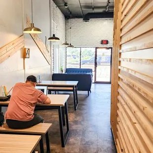 a man sitting at a table
