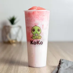 a pink drink with a cartoon character on it