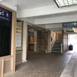 Sign with entrance from Marina side