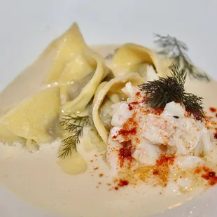 Our ninth course was Tom Kha made with Jonah crab, charred eggplant tortellini and bronze fennel.