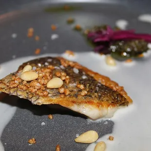 Our seventh course was Desert Fish made with barramundi, fumet, aged beef fat salsa verde, sour cabbage and pine nuts.