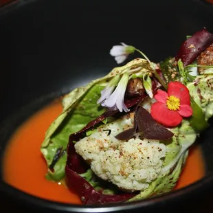 Our fourth course was Mark&apos;s Bouquet made with mokum carrot leche de tigre, castle-franco chicory, trevisa, purple butterfly sorrel.