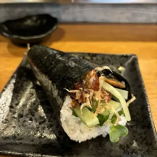 a close up of a piece of sushi