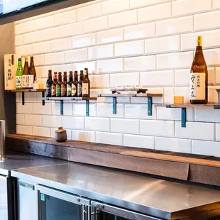a kitchen with stainless steel counter tops