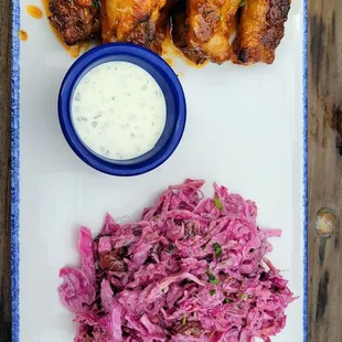 Island chicken wings and Cole slaw , pretty tasty , the wings were good but could use a little heat to it.