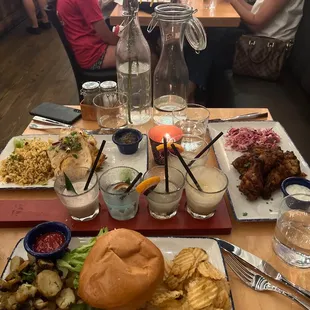 The roti wrap, wings and three pepper cheeseburger. I also got a frozen flight. Everything was delicious and service was fast!
