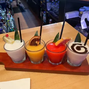 Drink flight - Caribbean Colada, island sunset, stormy red, arctic white