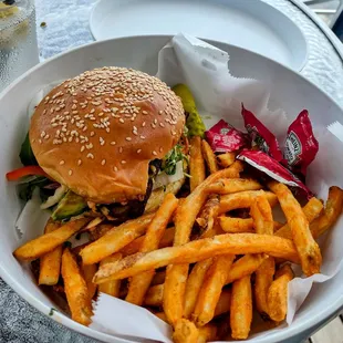 Blackened Grouper sandwich and fries.