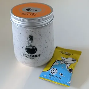 Coconut pudding with black sesame. Free coconut flakes