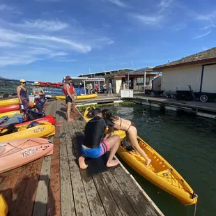 Helping kayakers in and out of kayak!!!