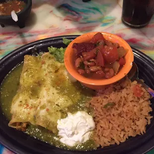 Enchiladas Suizas with rice and beans, sour cream, very delicious.