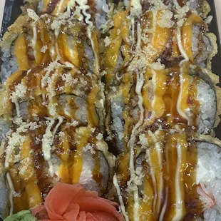This is crunchy roll..salmon.tuna.kani.cream chees fried and top special souce