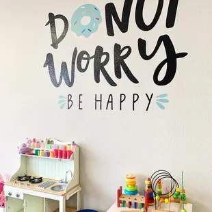 a donut works be happy sign