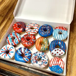 a box of decorated donuts