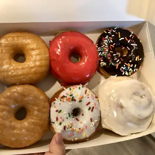 a dozen donuts in a box