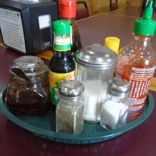 Lots of condiments on each table.