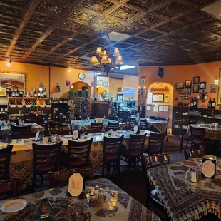 a restaurant with tables and chairs