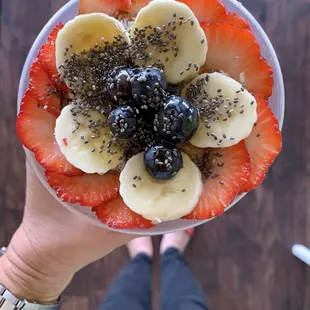 Açaí bowl in plastic bowl