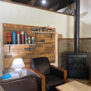 a living room with a wood burning stove