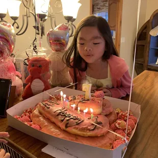 Her birthday cake Donuts in Kolsa&apos;s Donuts