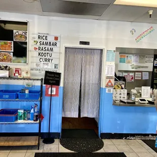 a woman standing at the counter