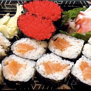 Takeout salmon roll, octopus sashimi and flying fish roe nigiri