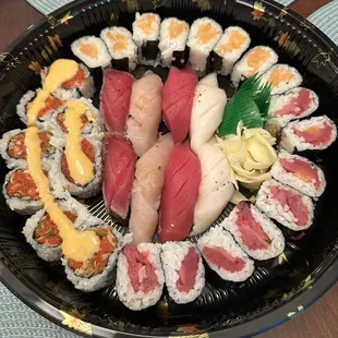 E8. Tuna Flight, R2. Salmon Roll, R2. Tuna Roll