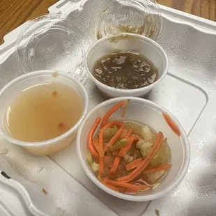 Atsara, suka (vinegar sauce) and lechon sauce