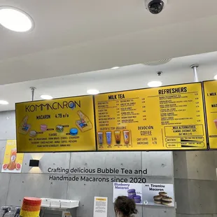 menus on the wall above the counter
