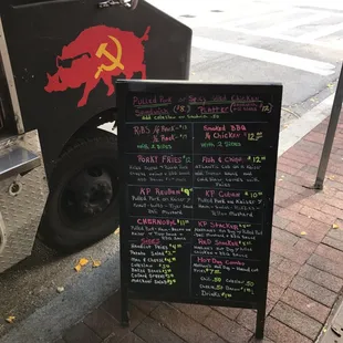 a menu on the side of the truck