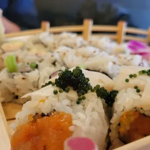 a close up of a plate of sushi