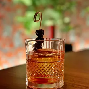 BARREL AGED OLD FASHIONED old forester 100 bourbon, demerara...w/added cherries