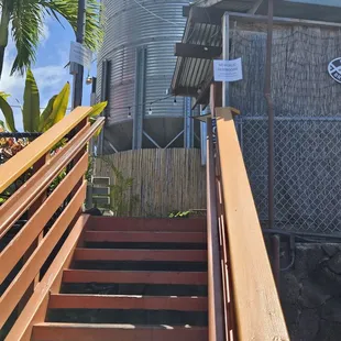 Stairs leading up from main road if you are on foot