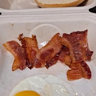 $10.00 morning plate!
 1 egg 1 bagel and couple pieces of bacon that cut in pieces.