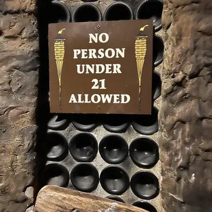 a no person under 21 allowed sign