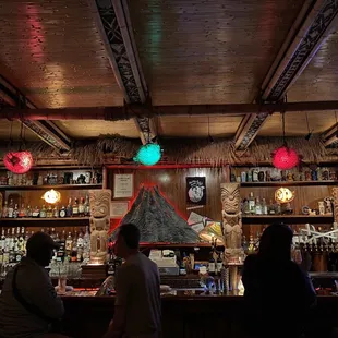 people sitting at the bar