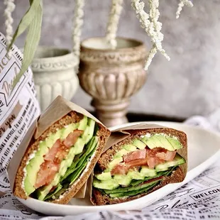 a sandwich cut in half on a plate