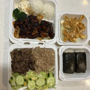 Crab Rangoon, Spam Musubi, Kona Fire Chicken, Kalua Pork with Cabbage, Hawaiian BBQ Beef, Macaroni Salad, Regular Green Mixed Salad