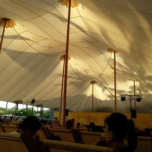 Under the big tent in the courtyard