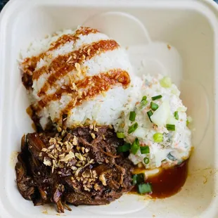 a meal in a styrofoam container