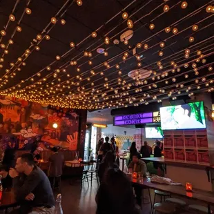 Interior, they're playing an interesting anime on the tv