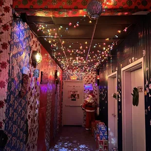 a hallway with christmas lights
