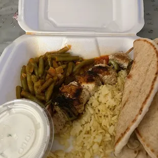 Chicken Kabob with rice, green beans, pita, tzatziki sauce &amp; side of marinara. So darn good. I order from here almost every week.