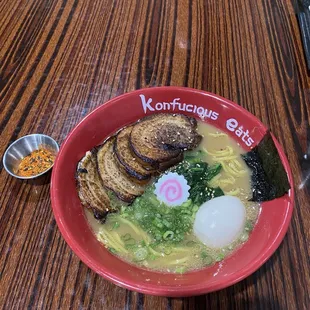 Extra pork chashu in Paitan (chicken broth) Ramen topped with spinach, scallions, nori and a seasoned egg full of jammy yolk!