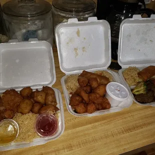 Sweet and sour pork with lemon chicken, sweets and sour pork, and beef with broccoli. All with egg roll and fried rice