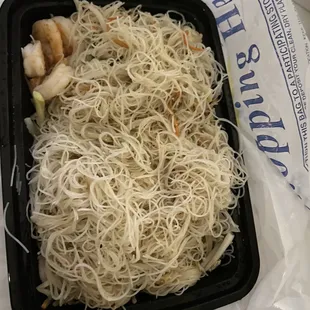 These shrimp rice noodles are bland and plain. Nothing like Singapore rice noodles. No flavor