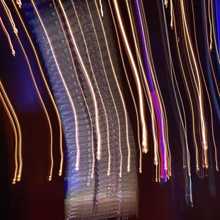 a view of a clock tower at night