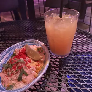 Street corn and pineapple juice.