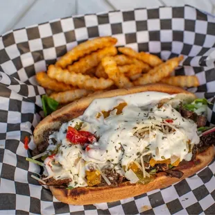 Kings cheesesteak sandwich with fries