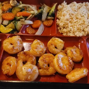 a plate of food with rice and vegetables